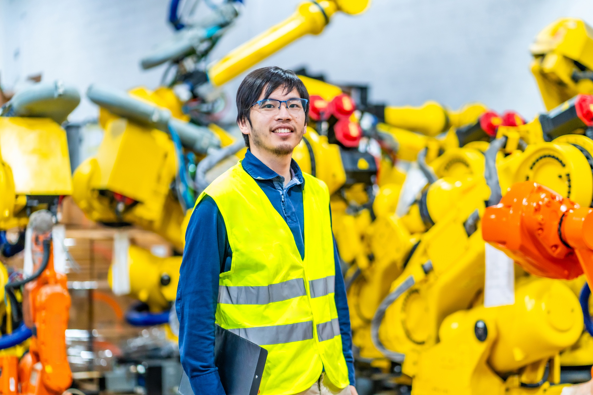 Portrait of a chief engineer of a industrial robots